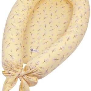 Babynest i økologisk bomuld - Müsli - Calm yellow - Print med små blomstergrene - 75x40 cm